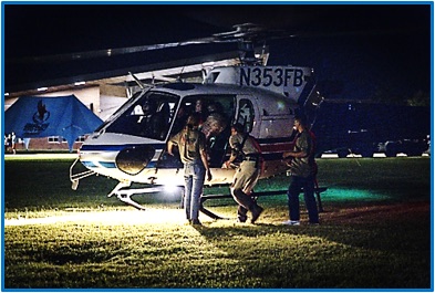 Operators boarding a helicopter at night at Black Ops