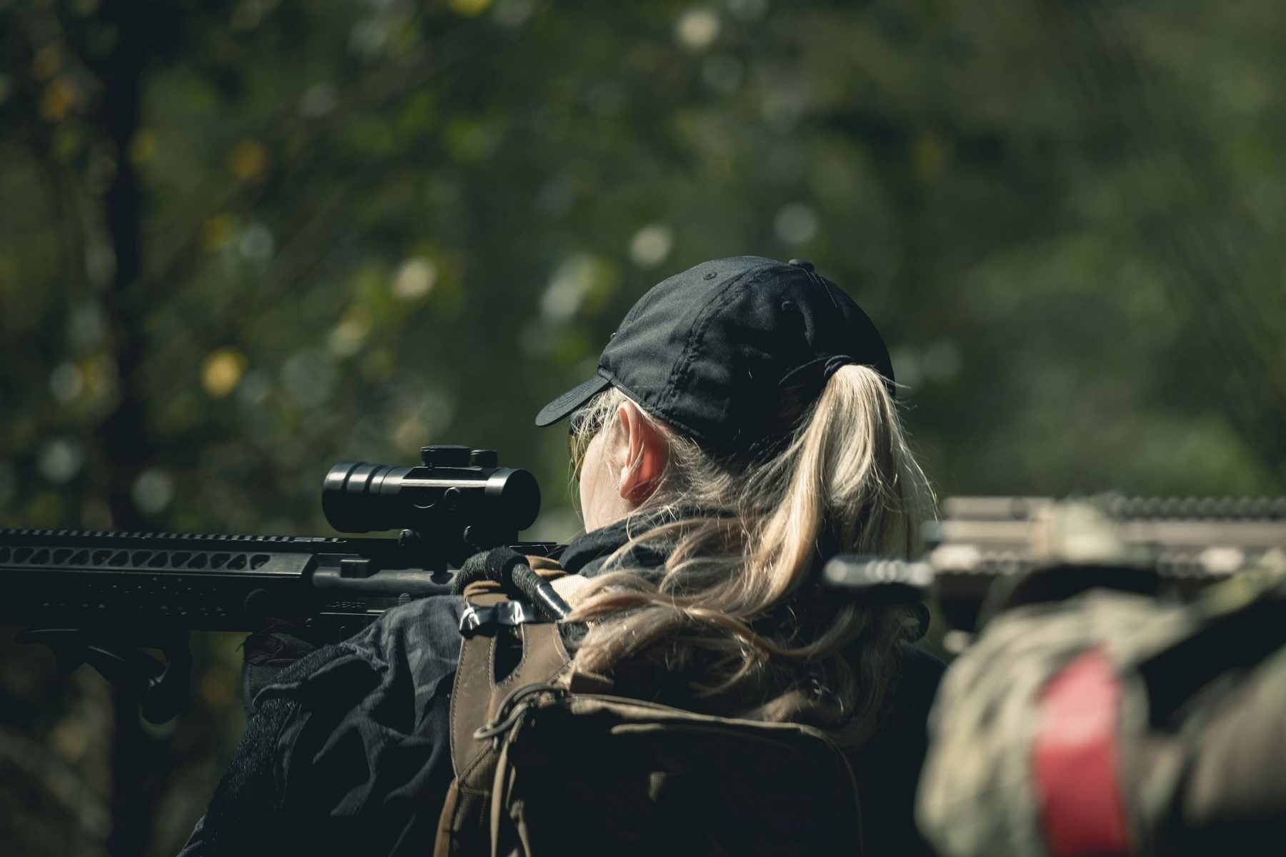 A woman on the optic during firearms training